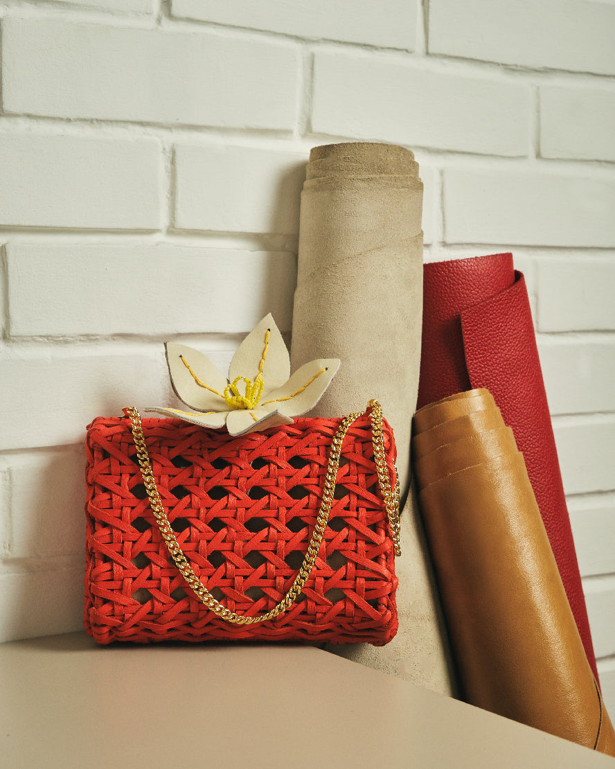 Aranaz outlets woven cotton leather clutch